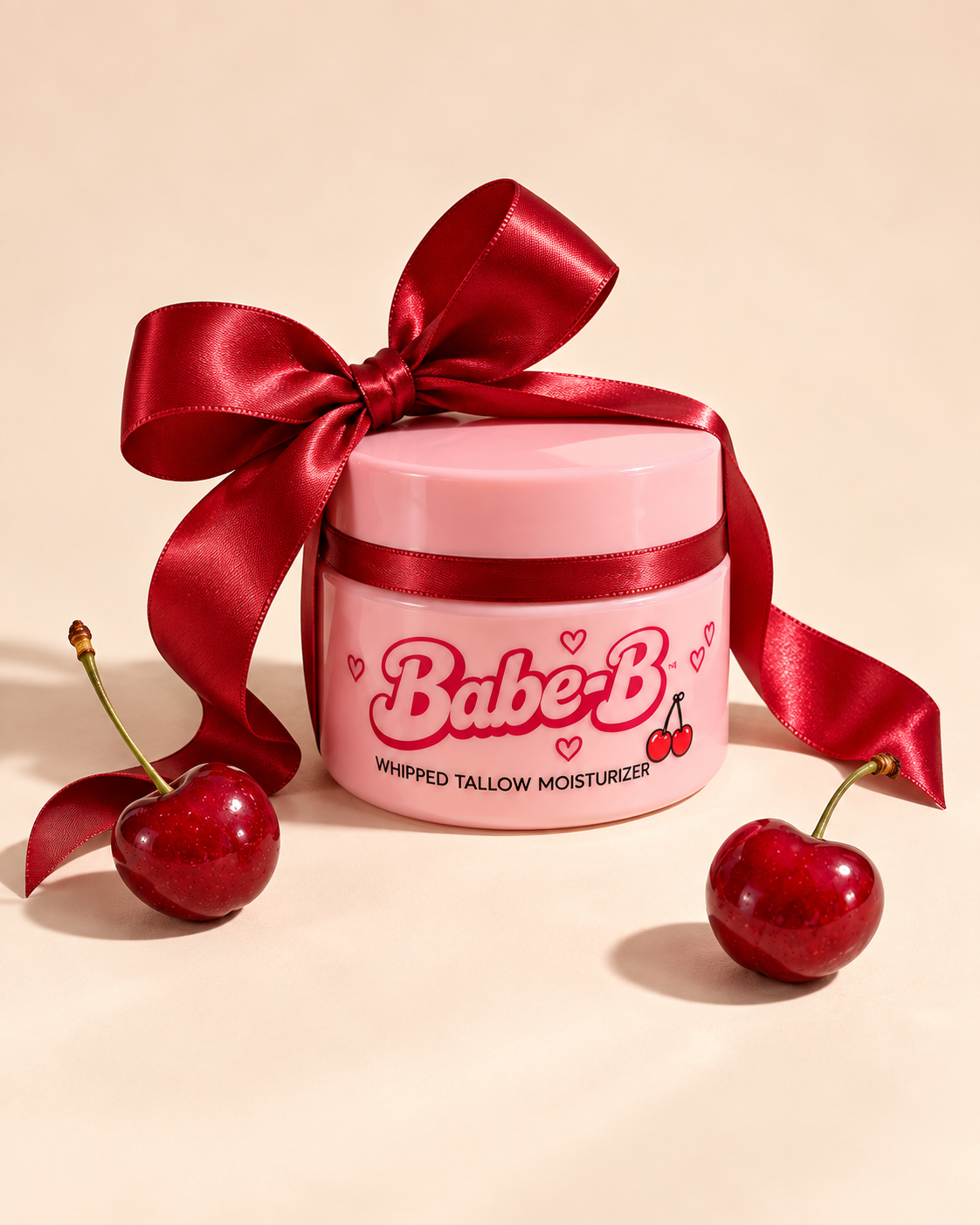 Pink Babe-B jar tied with a complete cherry-red satin bow