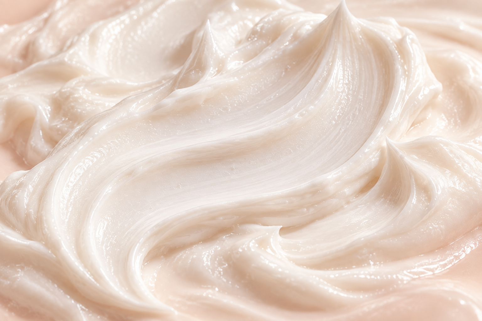 Close-up of white whipped moisturizer concept with a soft sweep and fine surface texture